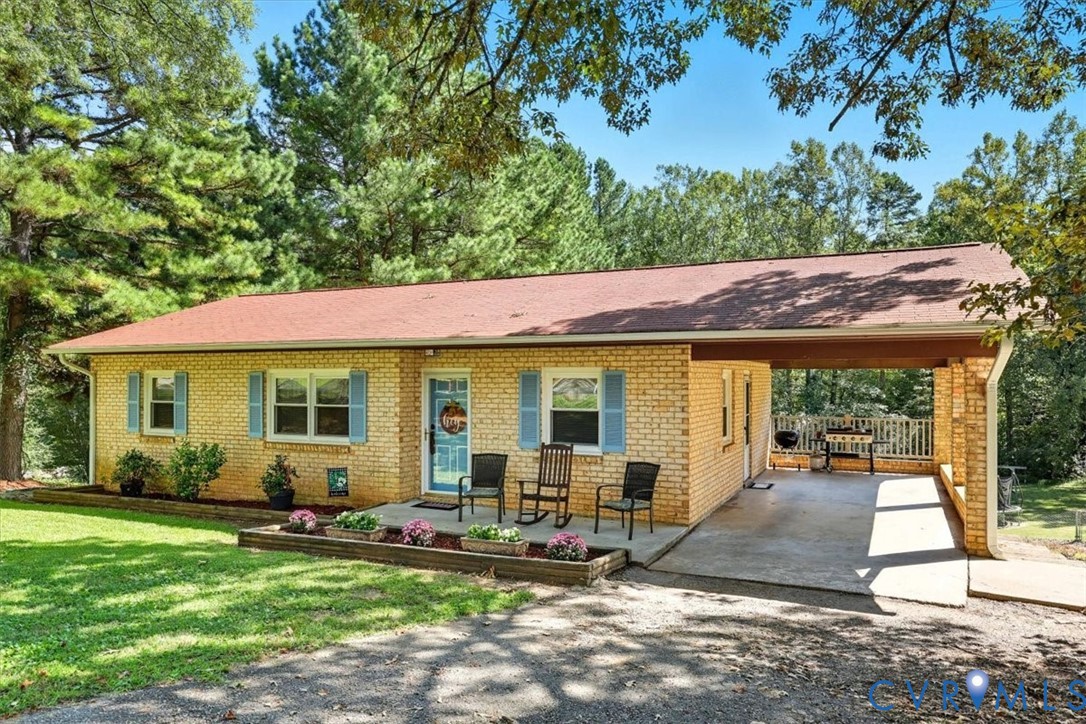 237 Craddock Street Boydton, VA 23917 - Photo 4 of 41 Single story home with brick siding, a carport, a