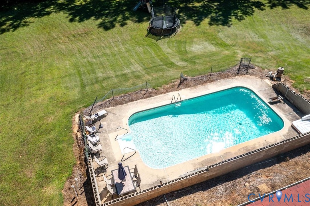 237 Craddock Street Boydton, VA 23917 - Photo 5 of 41 Swimming pool with a patio and a trampoline