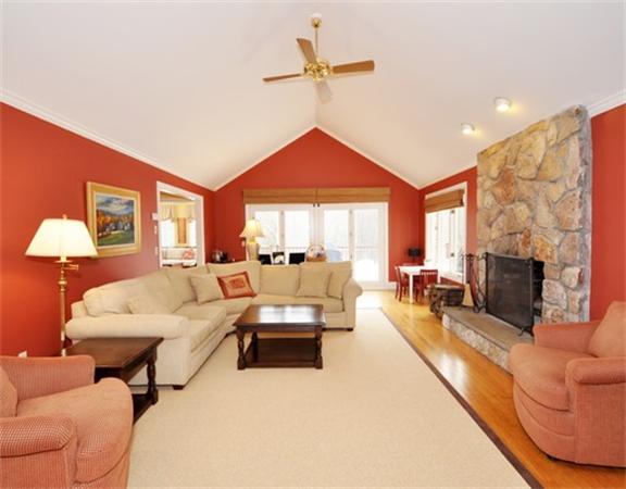 15 Garland Road Lincoln, MA 01773 - Photo 6 of 21 a living room with furniture fireplace and a large window