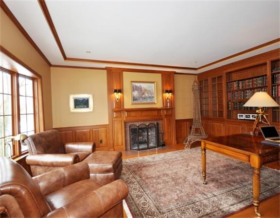 15 Garland Road Lincoln, MA 01773 - Photo 10 of 21 a living room with furniture and a fireplace