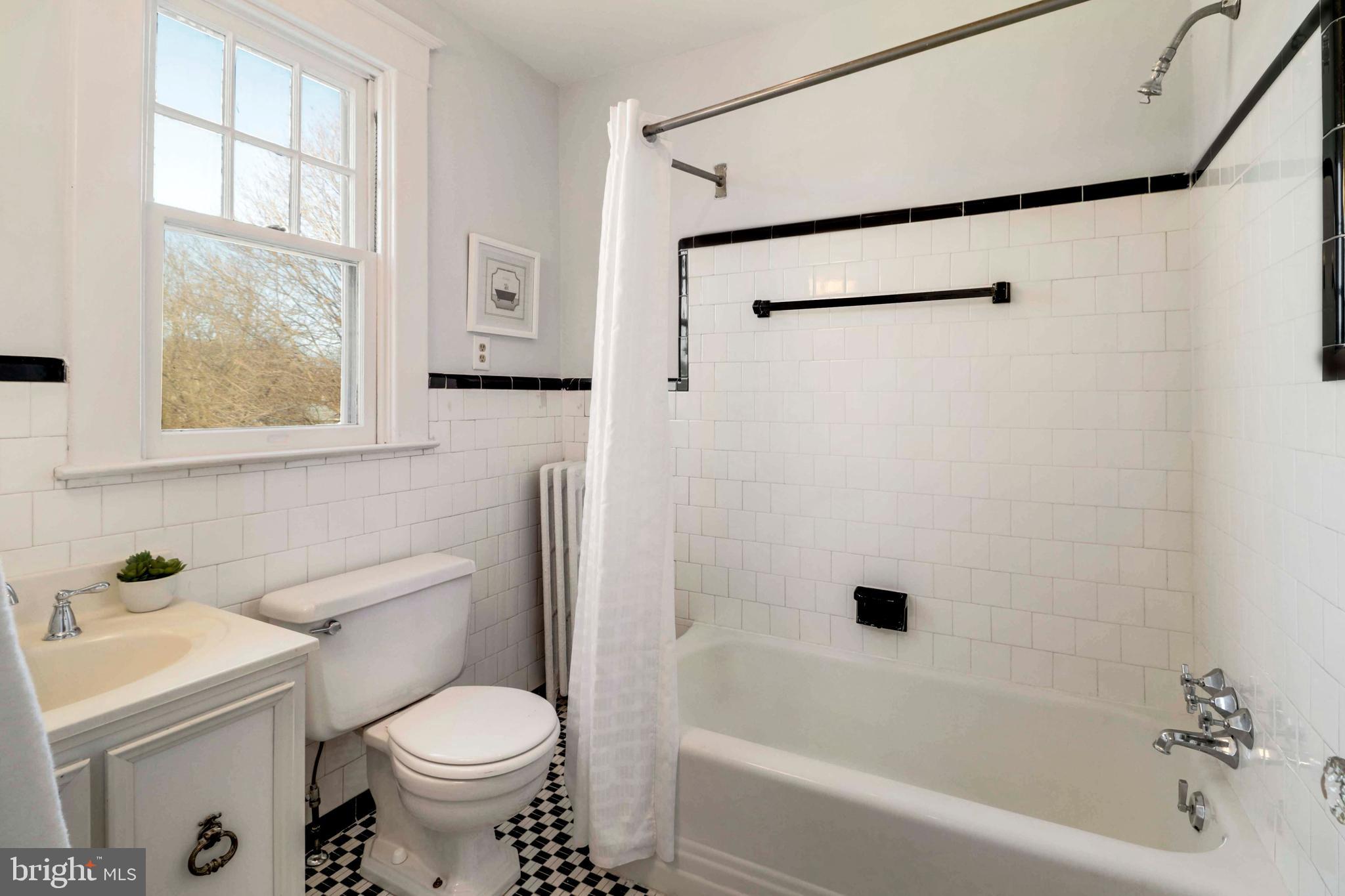 5314 Brabant Road Baltimore, MD 21229 - Photo 16 of 22 a bathroom with a sink toilet and shower