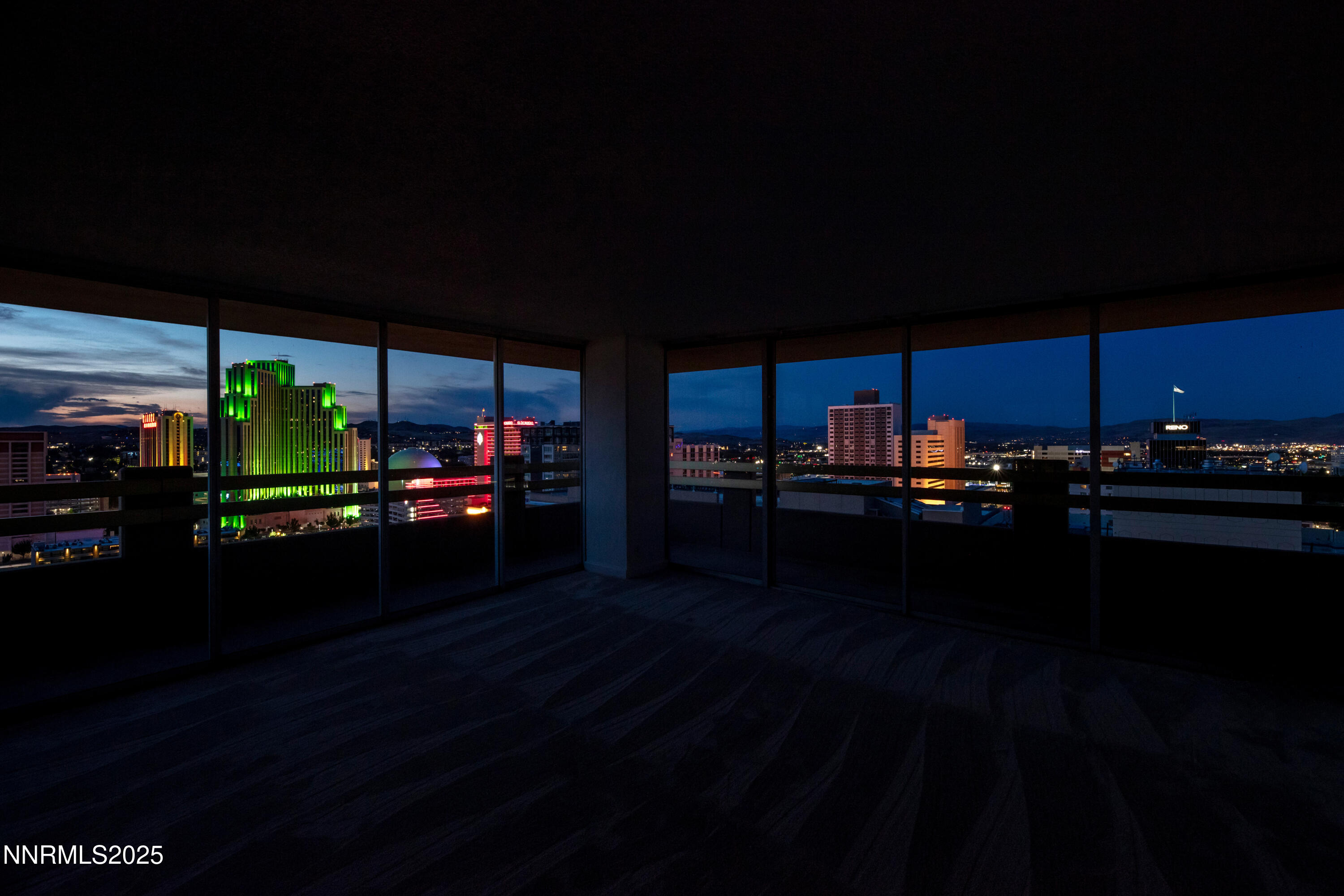 100 North Arlington Avenue, Unit 21K Reno, NV 89501 - Photo 20 of 24 a living room with lots of furniture and kitchen view