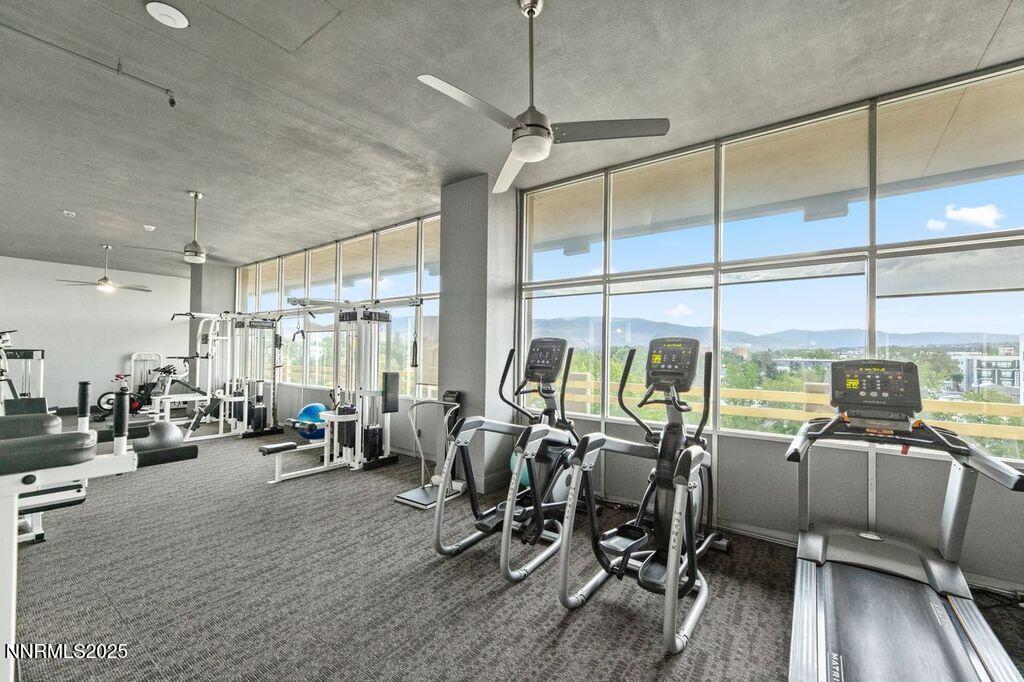 100 North Arlington Avenue, Unit 21K Reno, NV 89501 - Photo 22 of 24 a view of a room with gym equipment