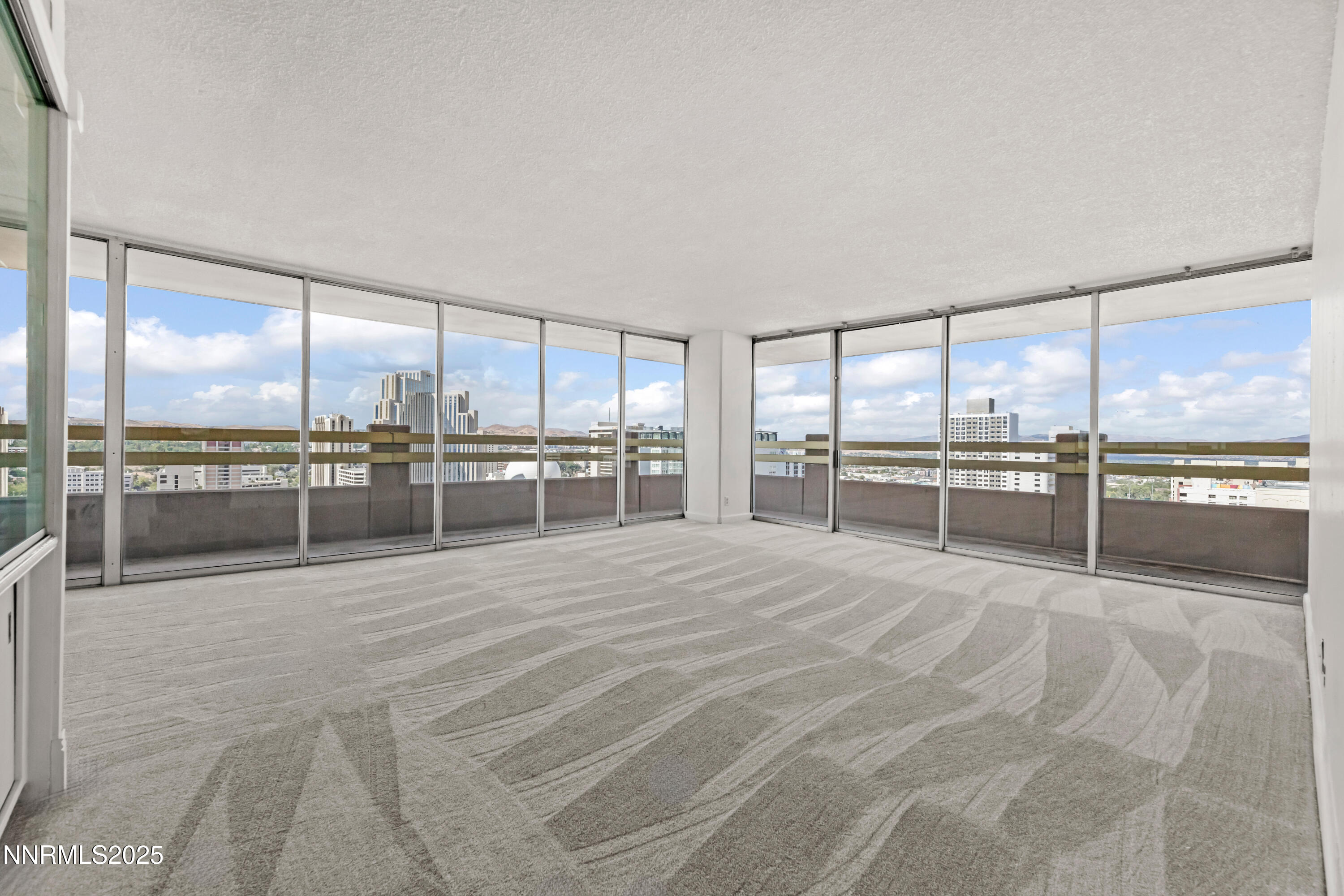 100 North Arlington Avenue, Unit 21K Reno, NV 89501 - Photo 3 of 24 a room with a large window