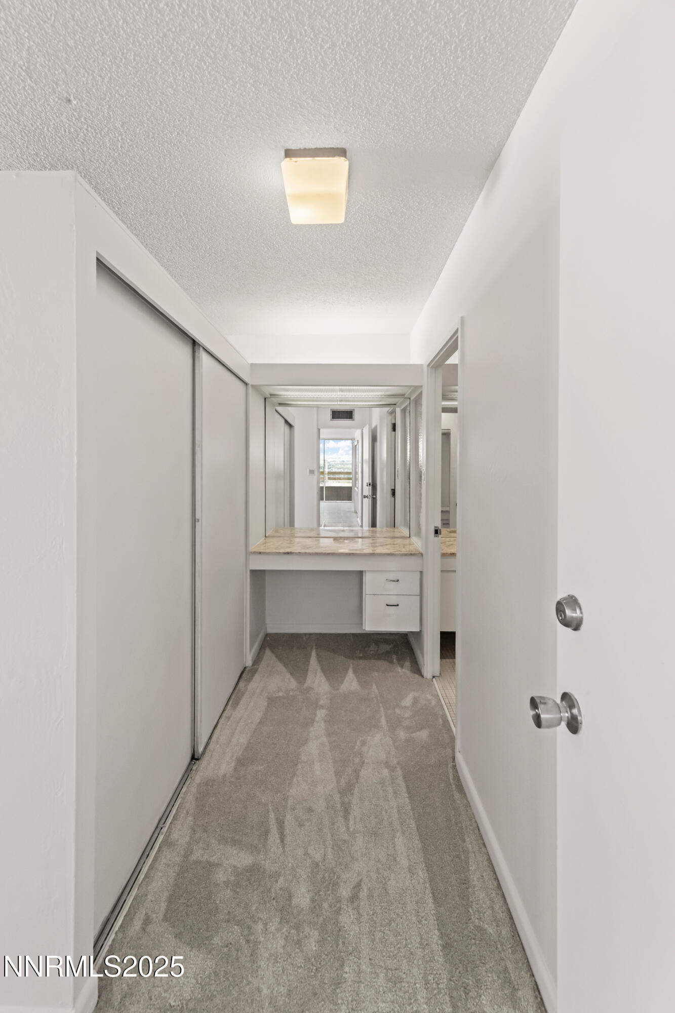 100 North Arlington Avenue, Unit 21K Reno, NV 89501 - Photo 9 of 24 a view of a room with white walls
