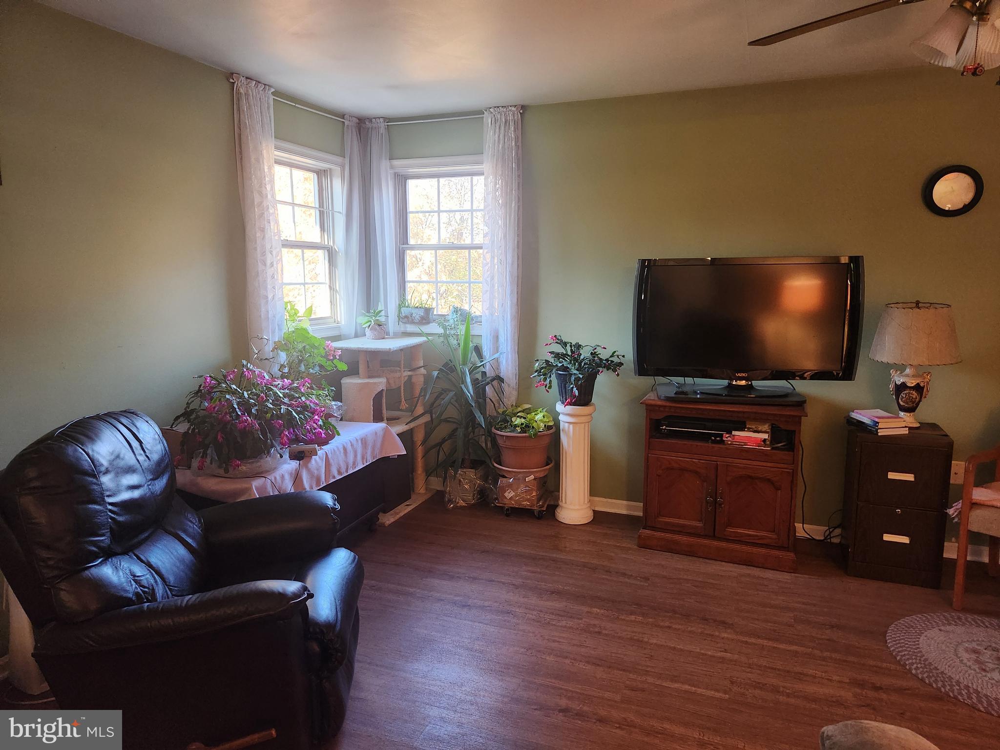 68 Daffodil Drive Manheim, PA 17545 - Photo 12 of 45 a living room with furniture and a flat screen tv