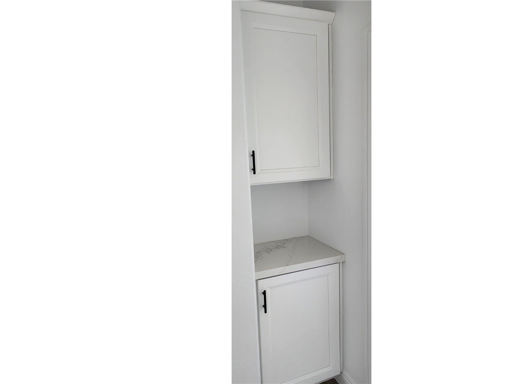 21053 Huasna Road Apple Valley, CA 92307 - Photo 12 of 19 Hall Storage with Polished Stone Counter