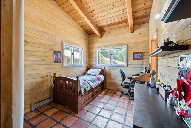 a kitchen with a granite countertop counter top space a sink and cabinets