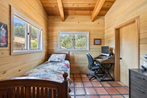 a white bath tub sitting in a bathroom