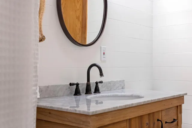 a view of a house with snow on the road