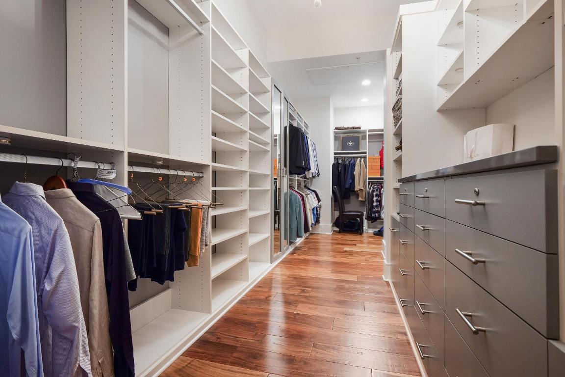 555 East 5th Street, Unit 3022 Austin, TX 78701 - Photo 23 of 40 a view of walk in closet with clothes and shoes