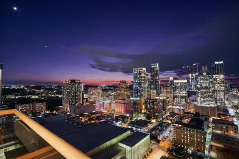 a city view with tall buildings