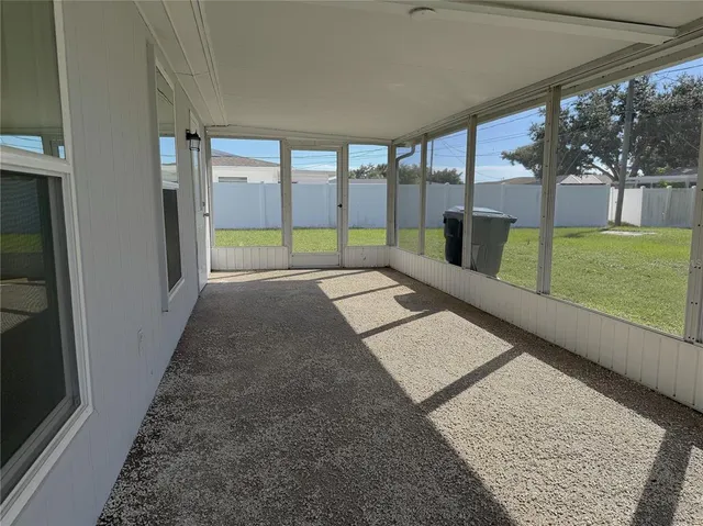 a front view of a house with a yard and a garage
