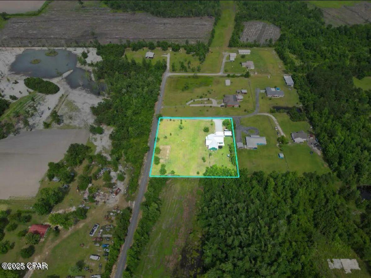 21382 Northwest Paradise Lane Altha, FL 32421 - Photo 2 of 47