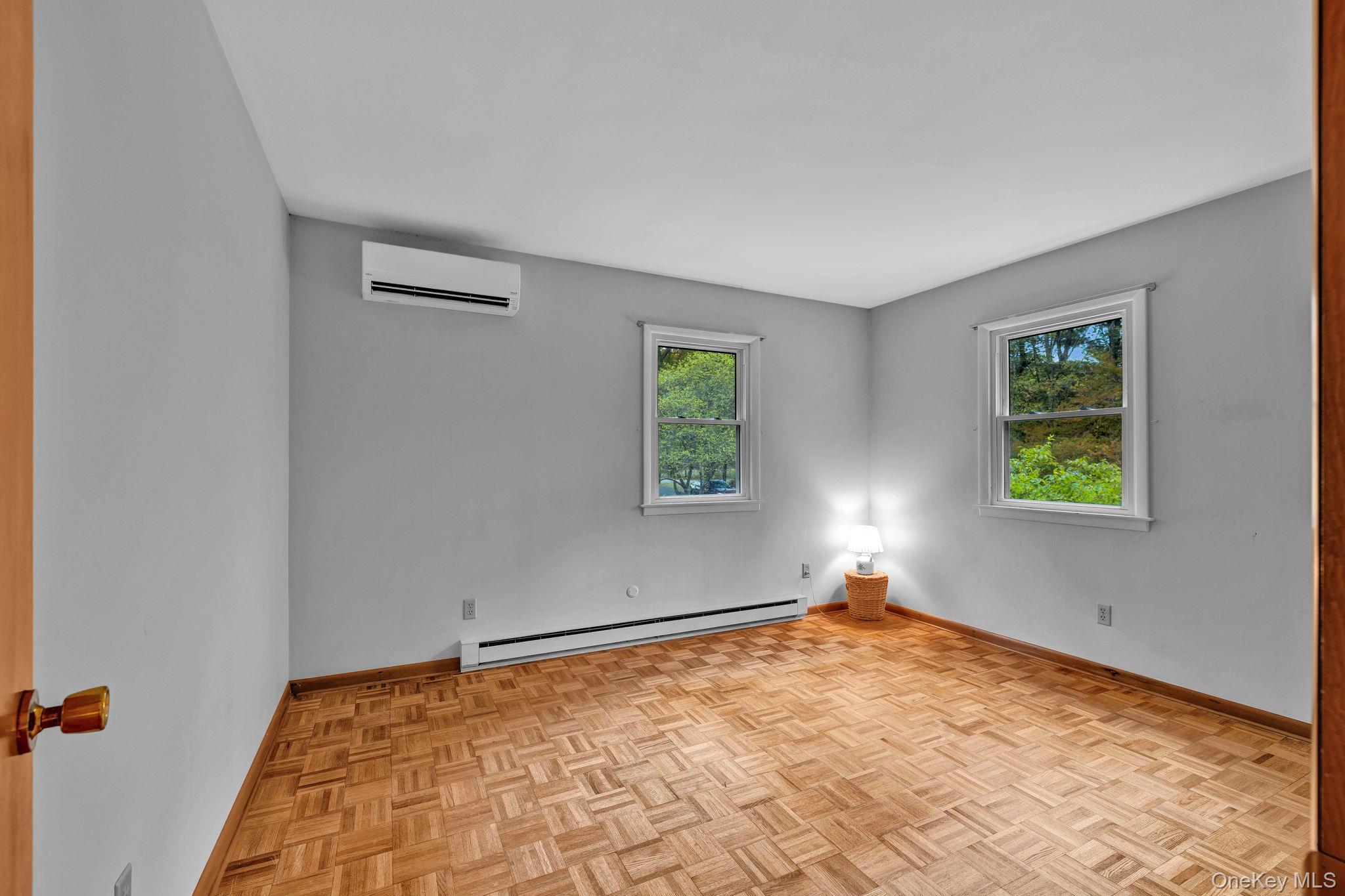 148 Moore Road Woodbourne, NY 12788 - Photo 16 of 36 a view of empty room with windows