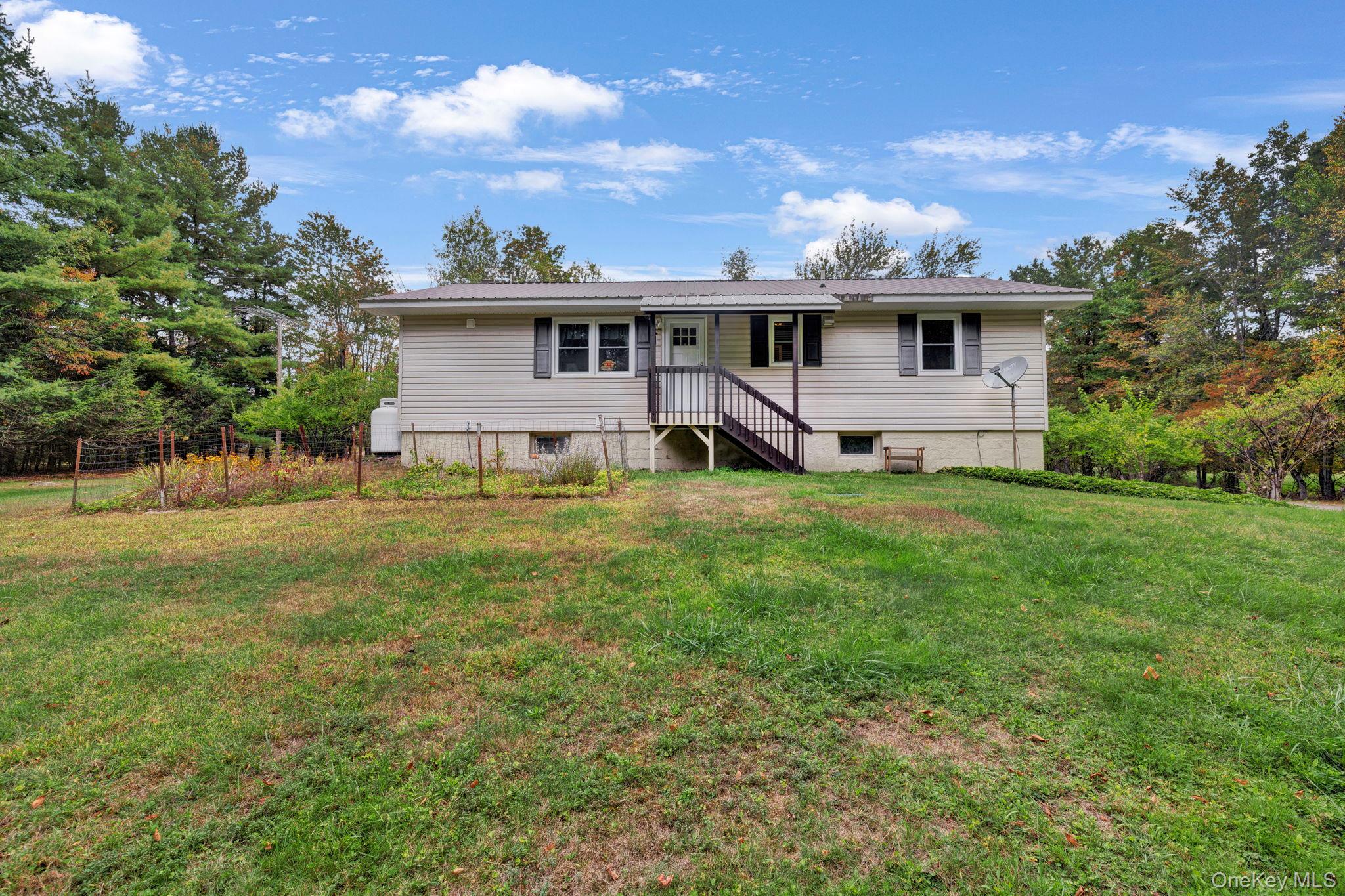 148 Moore Road Woodbourne, NY 12788 - Photo 28 of 36 a view of a yard of a house