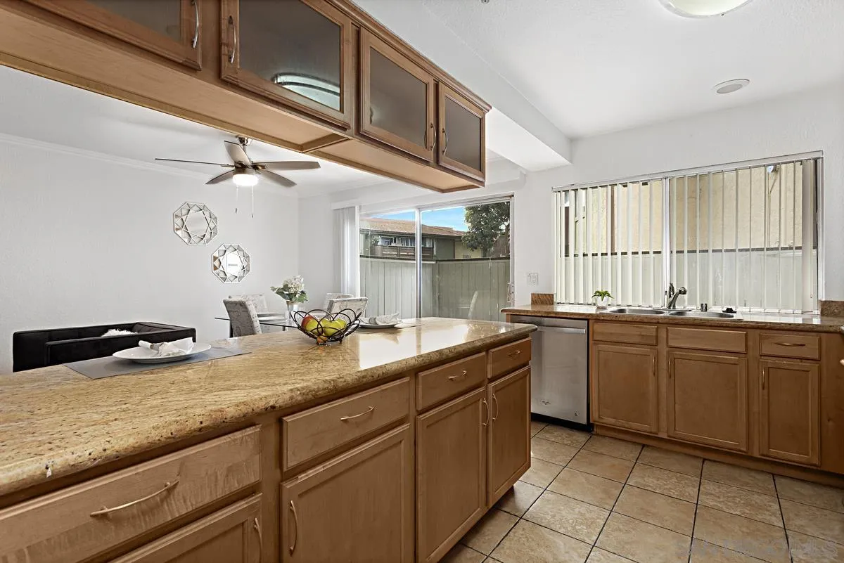 615 Fredricks Avenue, Unit 159 Oceanside, CA 92058 - Photo 15 of 26 a kitchen with sink and cabinets