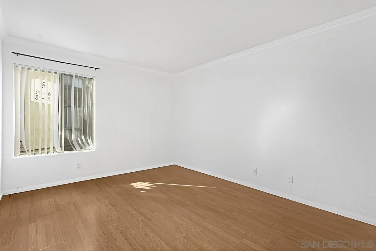 615 Fredricks Avenue, Unit 159 Oceanside, CA 92058 - Photo 20 of 26 an empty room with a window