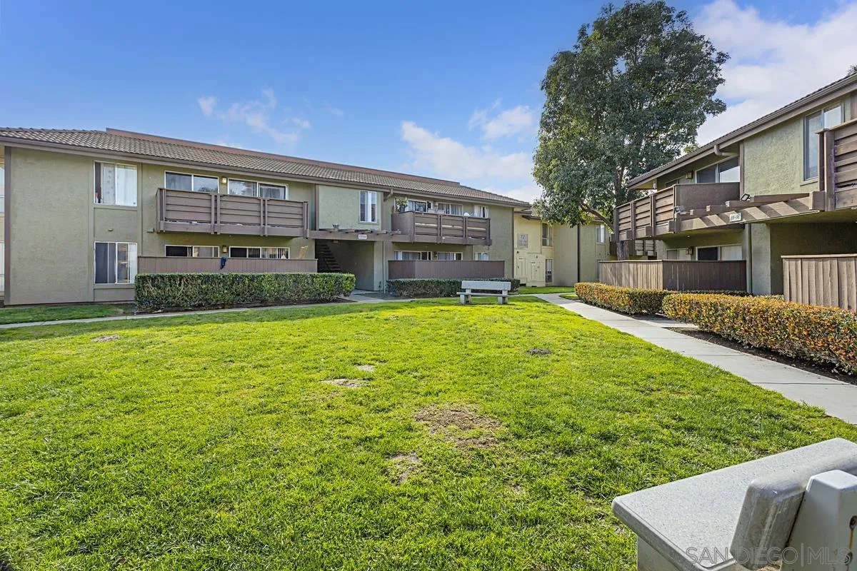615 Fredricks Avenue, Unit 159 Oceanside, CA 92058 - Photo 2 of 26 a view of a house with a yard