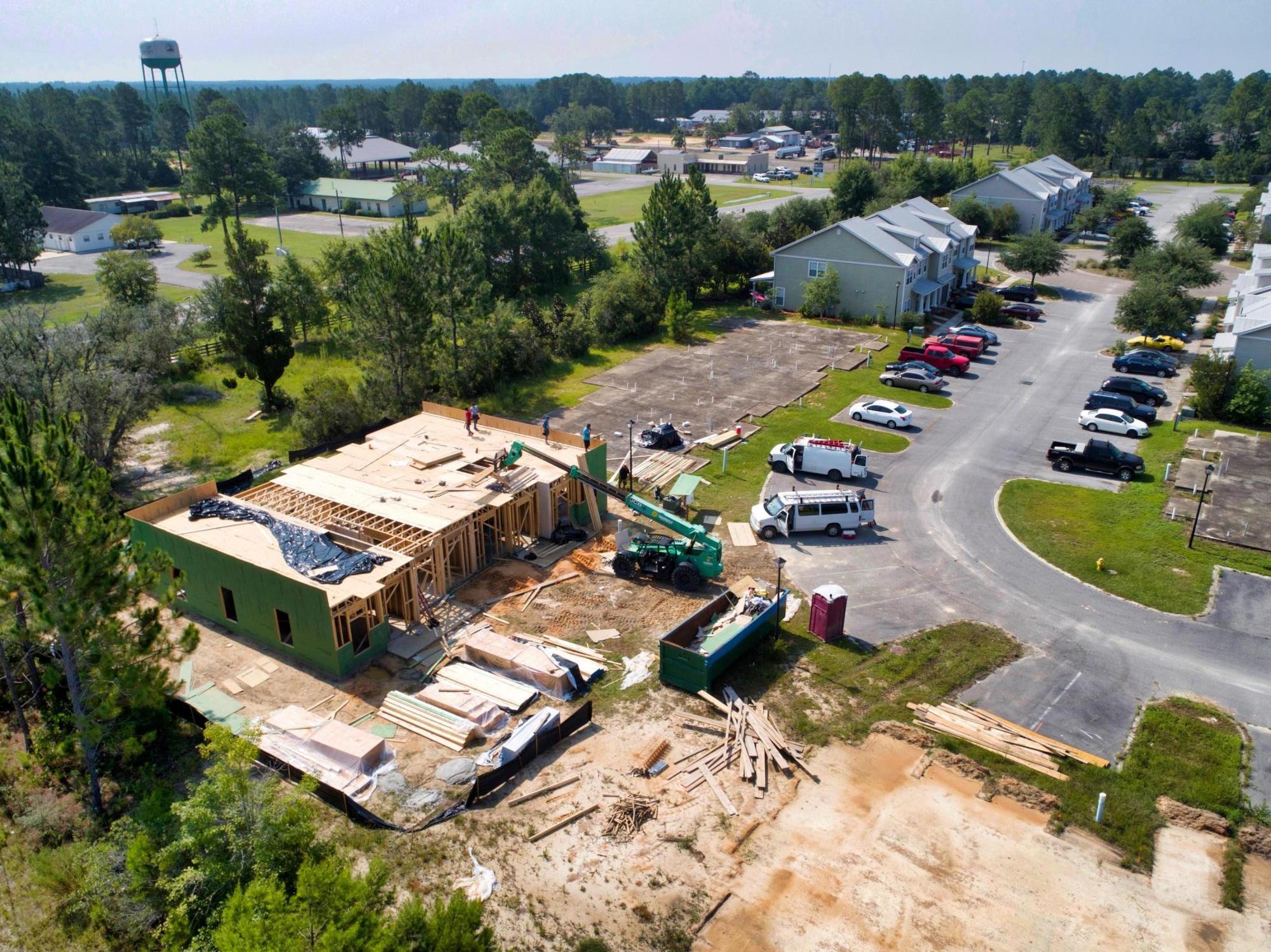 58 South Sand Palm Road, Unit LOT 40 Freeport, FL 32439 - Photo 15 of 34 an aerial view of a house with yard