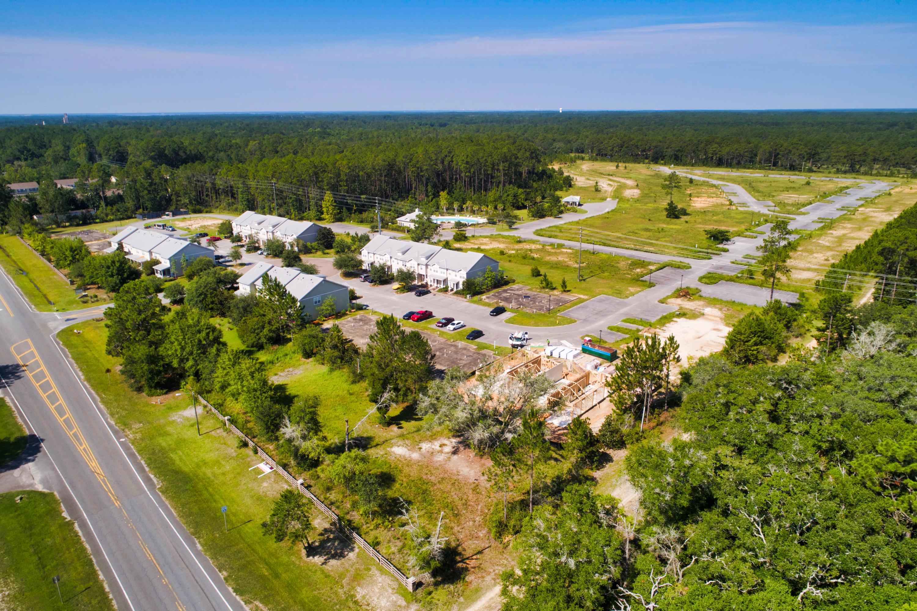 58 South Sand Palm Road, Unit LOT 40 Freeport, FL 32439 - Photo 23 of 34 a view of an outdoor space and a lake view
