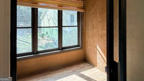 a view of a room that has a window in it