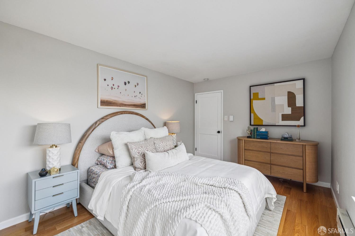 935 Filbert Street, Unit 3 San Francisco, CA 94133 - Photo 31 of 44 a bedroom with a bed and a dresser