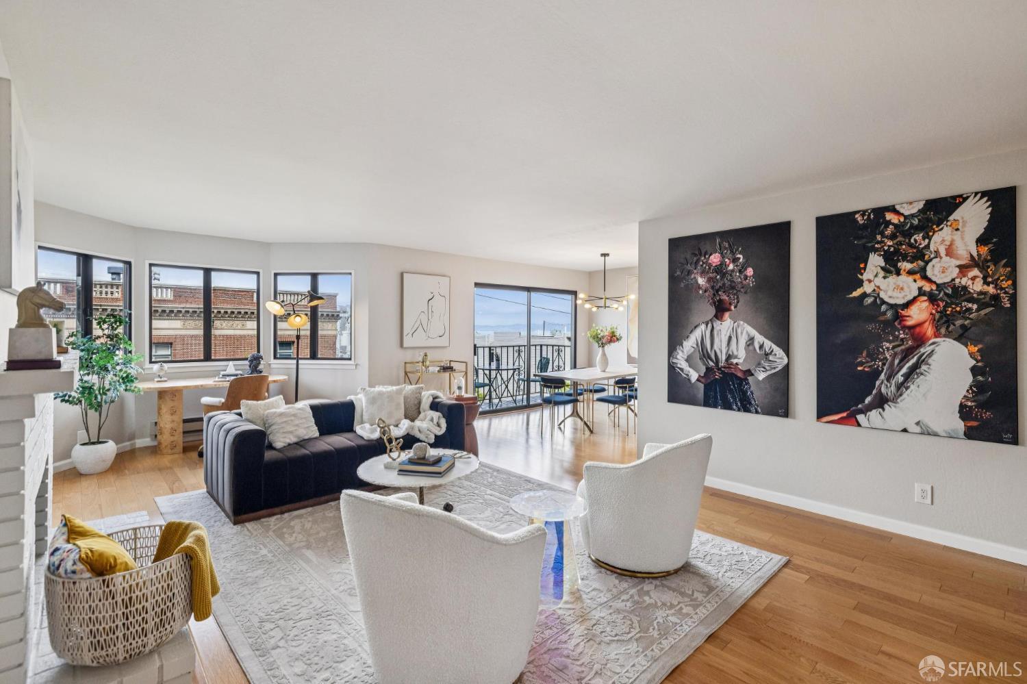 935 Filbert Street, Unit 3 San Francisco, CA 94133 - Photo 10 of 44 a living room with furniture and a large window