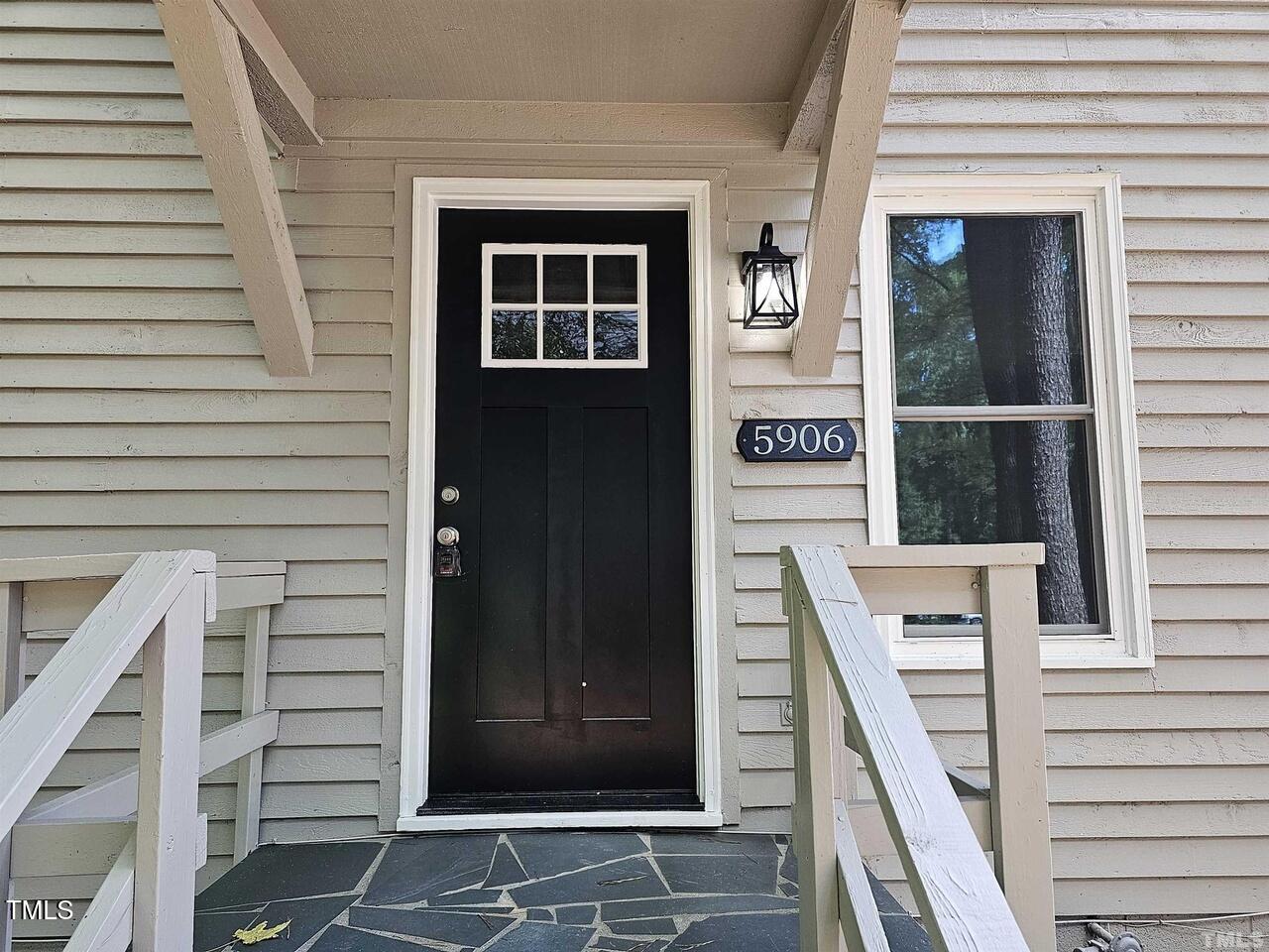 5906 Applewood Lane Raleigh, NC 27609 - Photo 13 of 14 a view of entryway door of the house