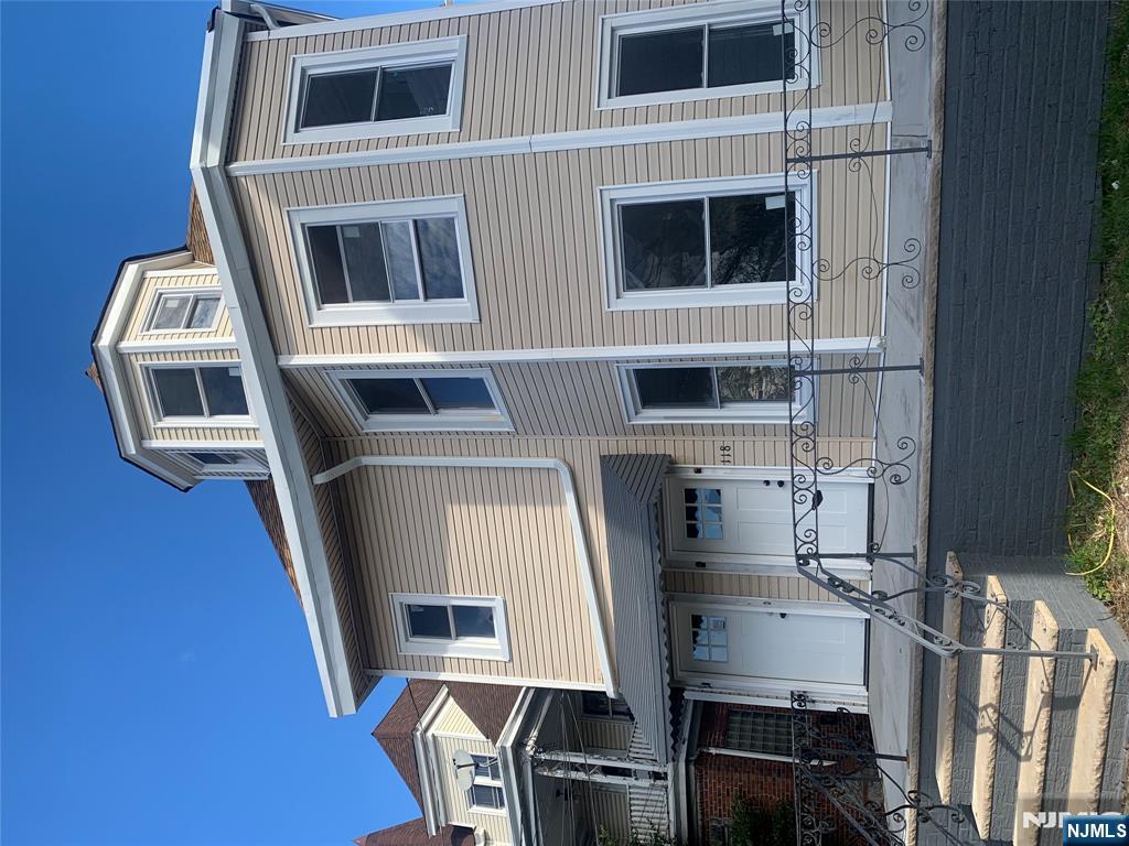 a front view of a house with windows