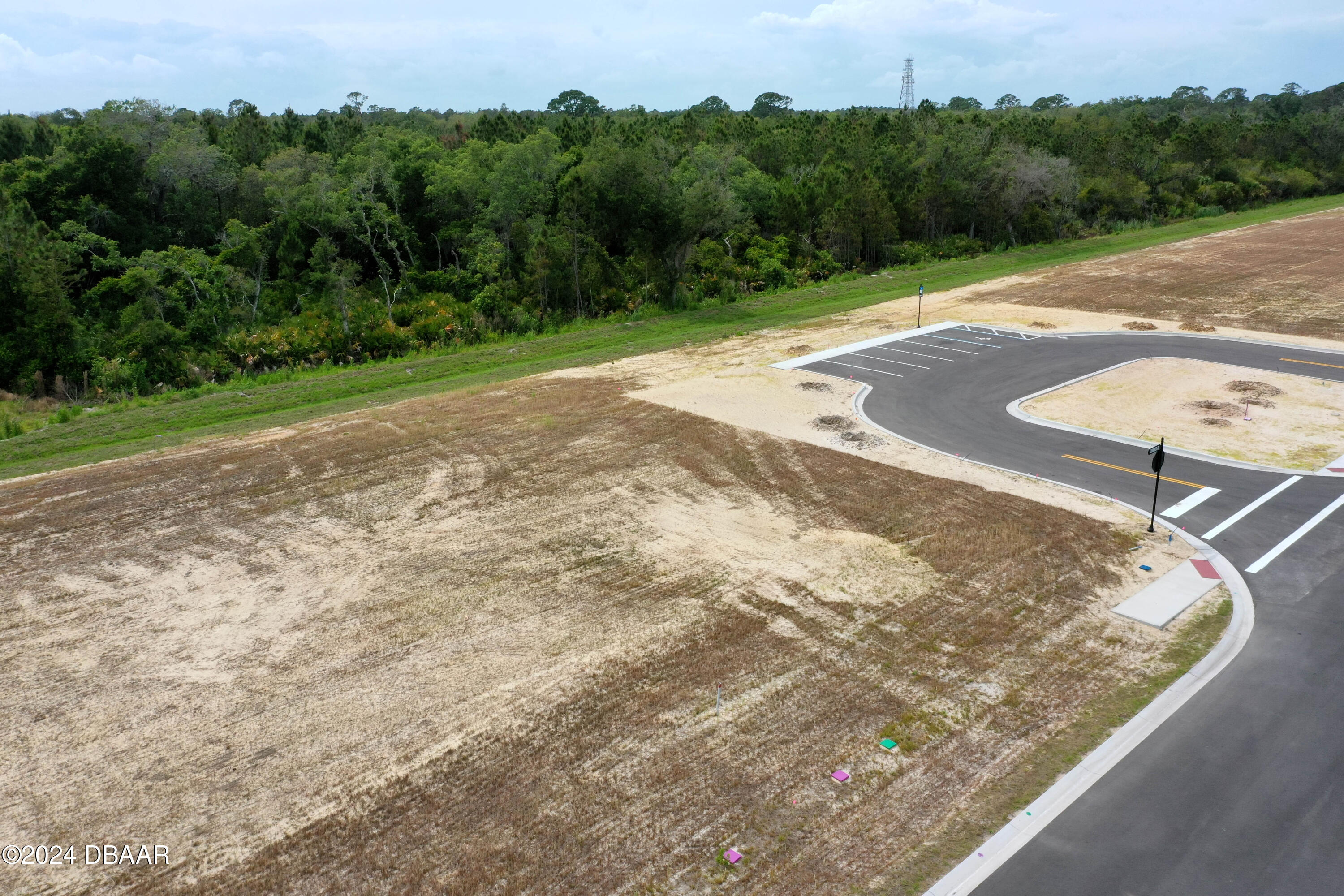 125 Coronado Road Flagler Beach, FL 32136 - Photo 22 of 46 an aerial view of a house with a yard