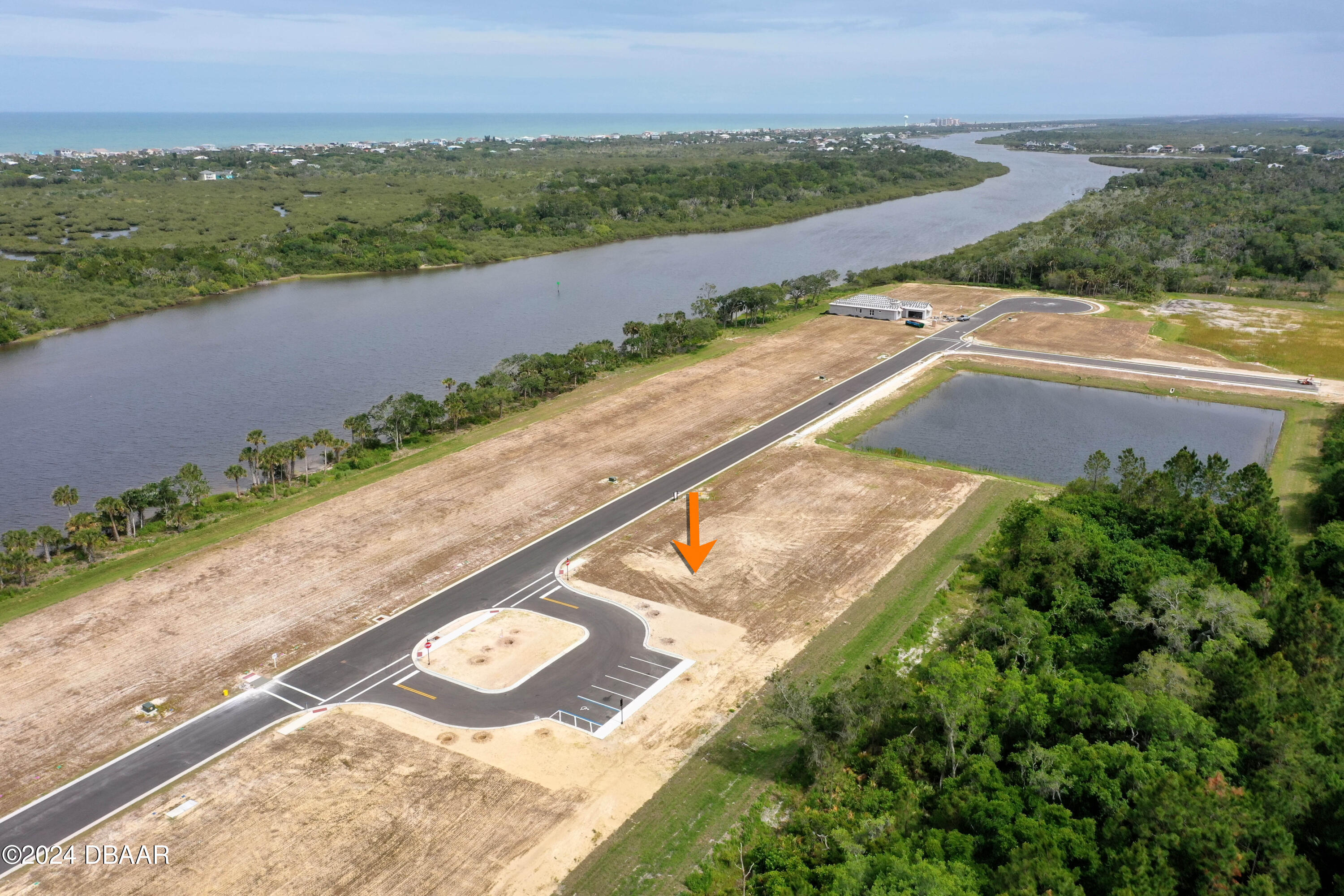 125 Coronado Road Flagler Beach, FL 32136 - Photo 23 of 46 an aerial view of a residential houses with outdoor space and river