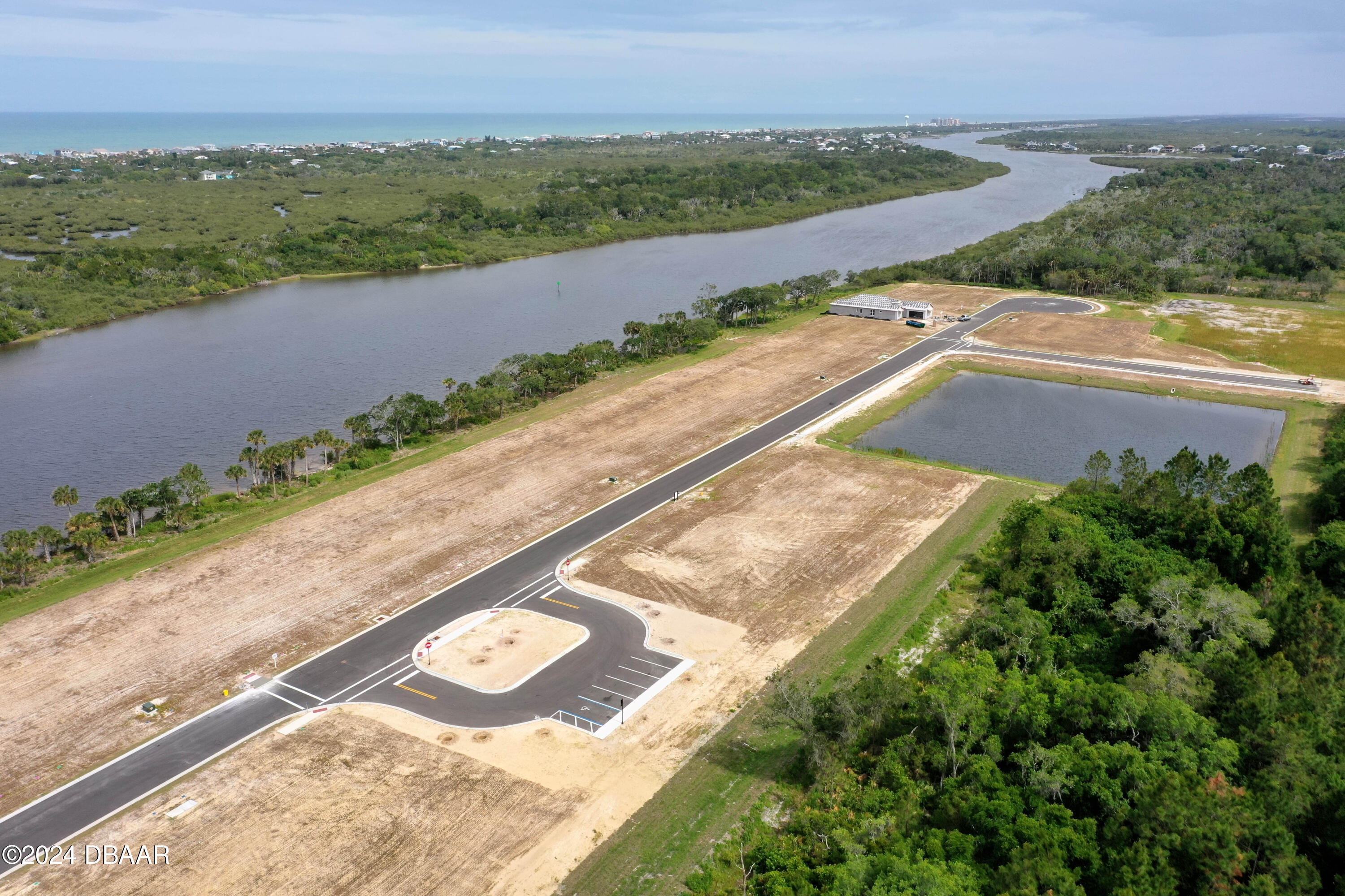 125 Coronado Road Flagler Beach, FL 32136 - Photo 24 of 46 an aerial view of a residential houses with outdoor space and river