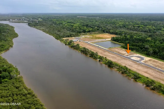 a view of a street with a garden