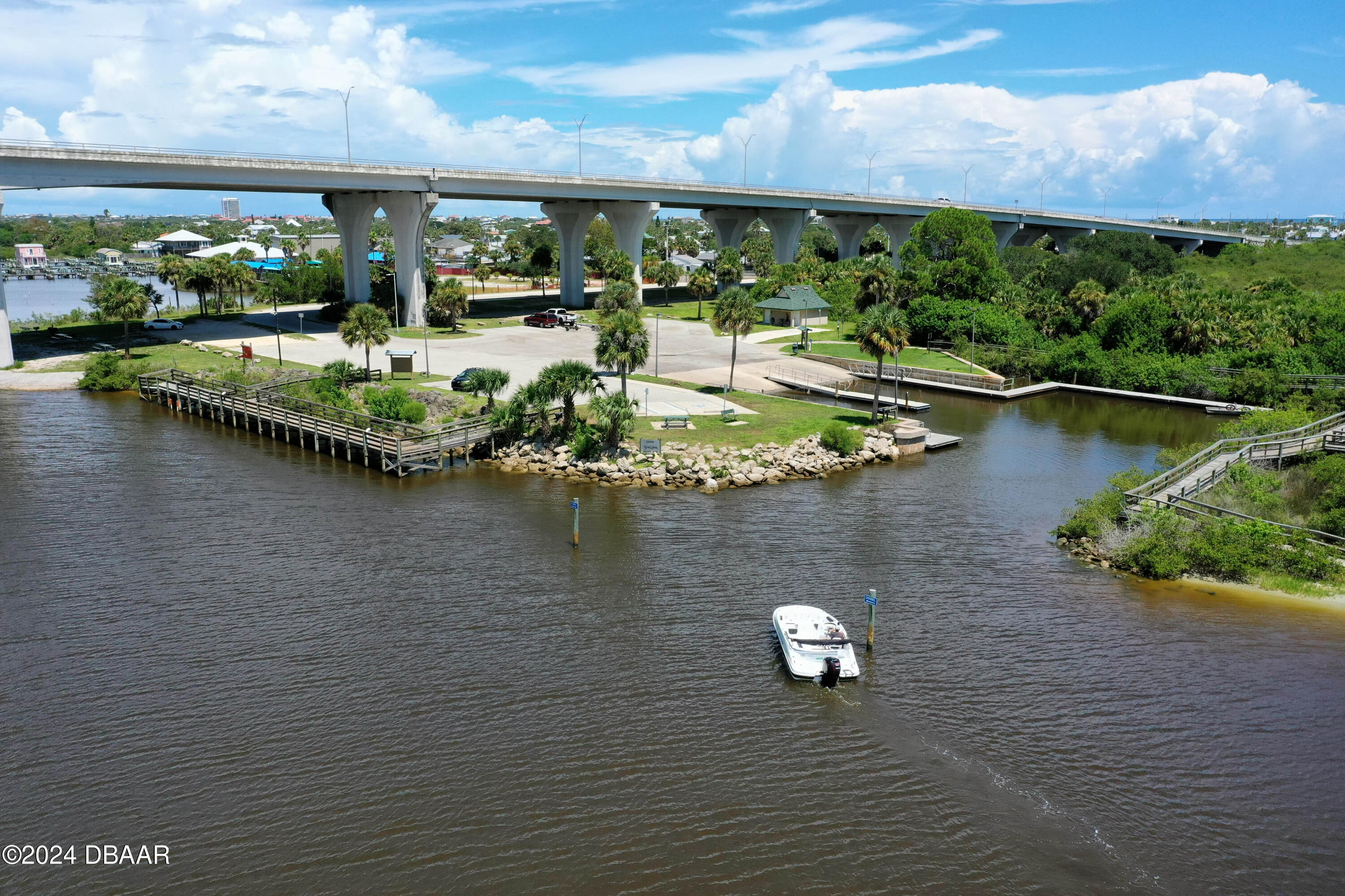125 Coronado Road Flagler Beach, FL 32136 - Photo 42 of 46 a view of a lake with outdoor seating space