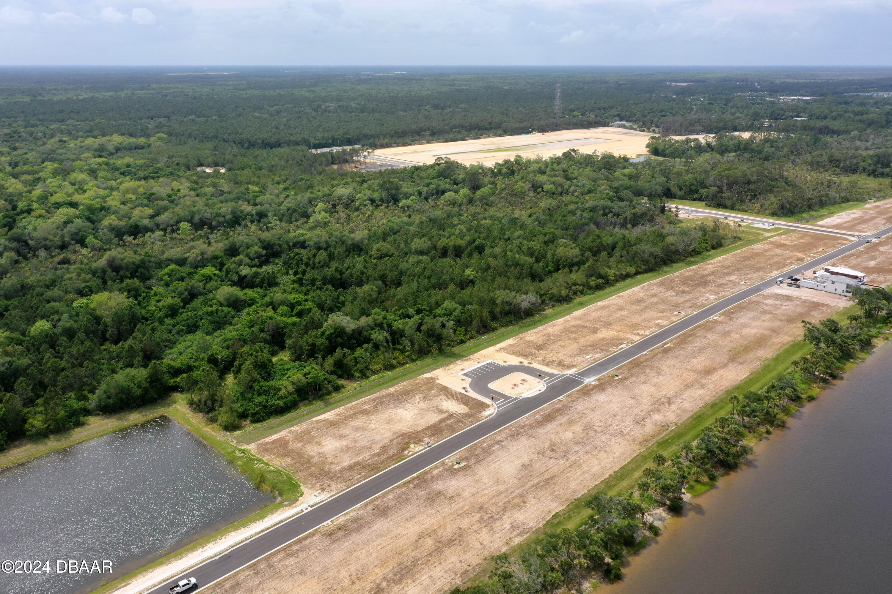 125 Coronado Road Flagler Beach, FL 32136 - Photo 6 of 46 a view of a yard with an ocean view
