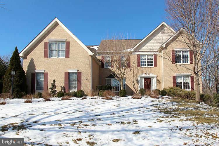1296 Gatesmeadow Way Reston, VA 20194 - Photo 1 of 29 a view of white house with a snow