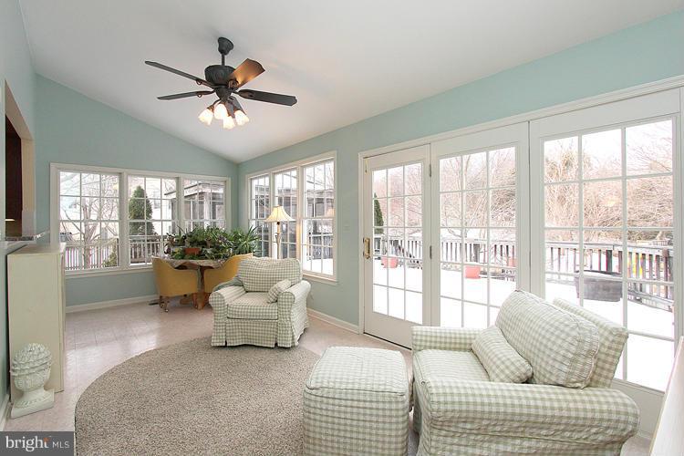 1296 Gatesmeadow Way Reston, VA 20194 - Photo 11 of 29 a living room with furniture and a large window