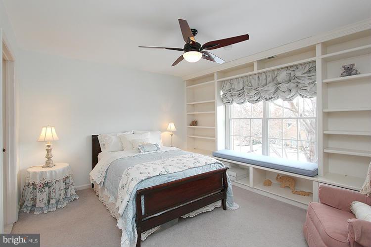 1296 Gatesmeadow Way Reston, VA 20194 - Photo 14 of 29 a bedroom with a bed and a large window