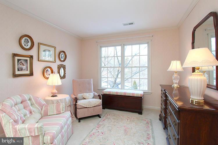 1296 Gatesmeadow Way Reston, VA 20194 - Photo 19 of 29 a living room with furniture and a window