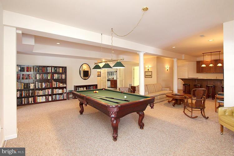 1296 Gatesmeadow Way Reston, VA 20194 - Photo 23 of 29 a living room with furniture a table and chairs
