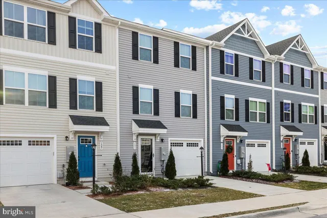 a front view of residential houses
