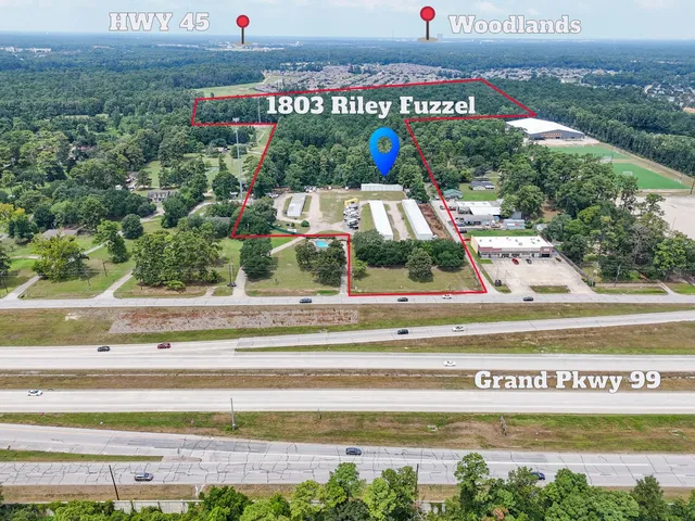 a view of a living room with a window