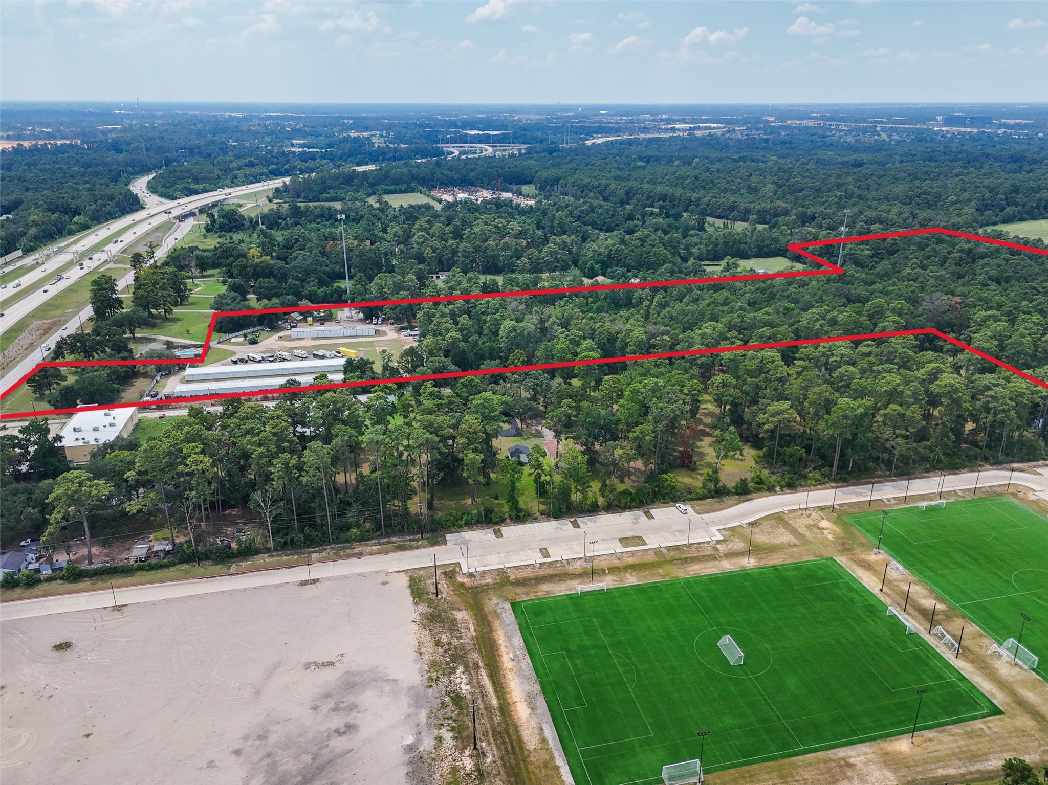 1803 Riley Fuzzel Road Spring, TX 77386 - Photo 6 of 6 a view of a garden with a swimming pool