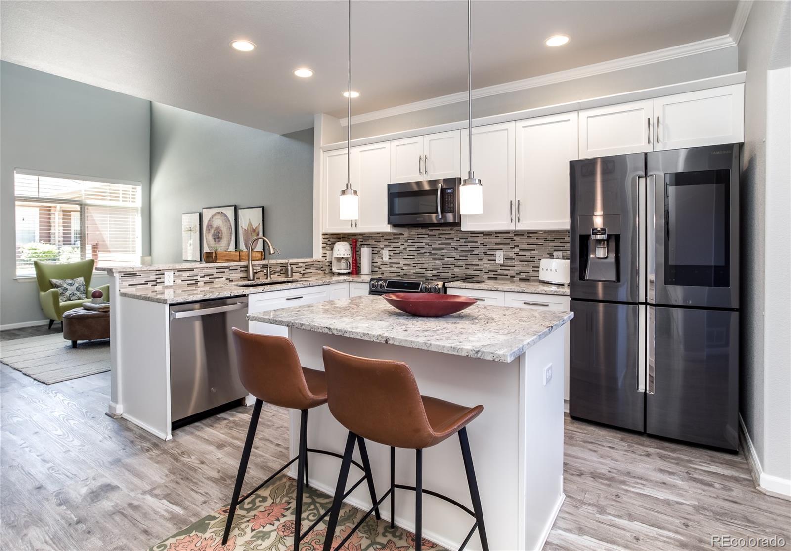 8602 Gold Peak Drive, Unit F Highlands Ranch, CO 80130 - Photo 6 of 35