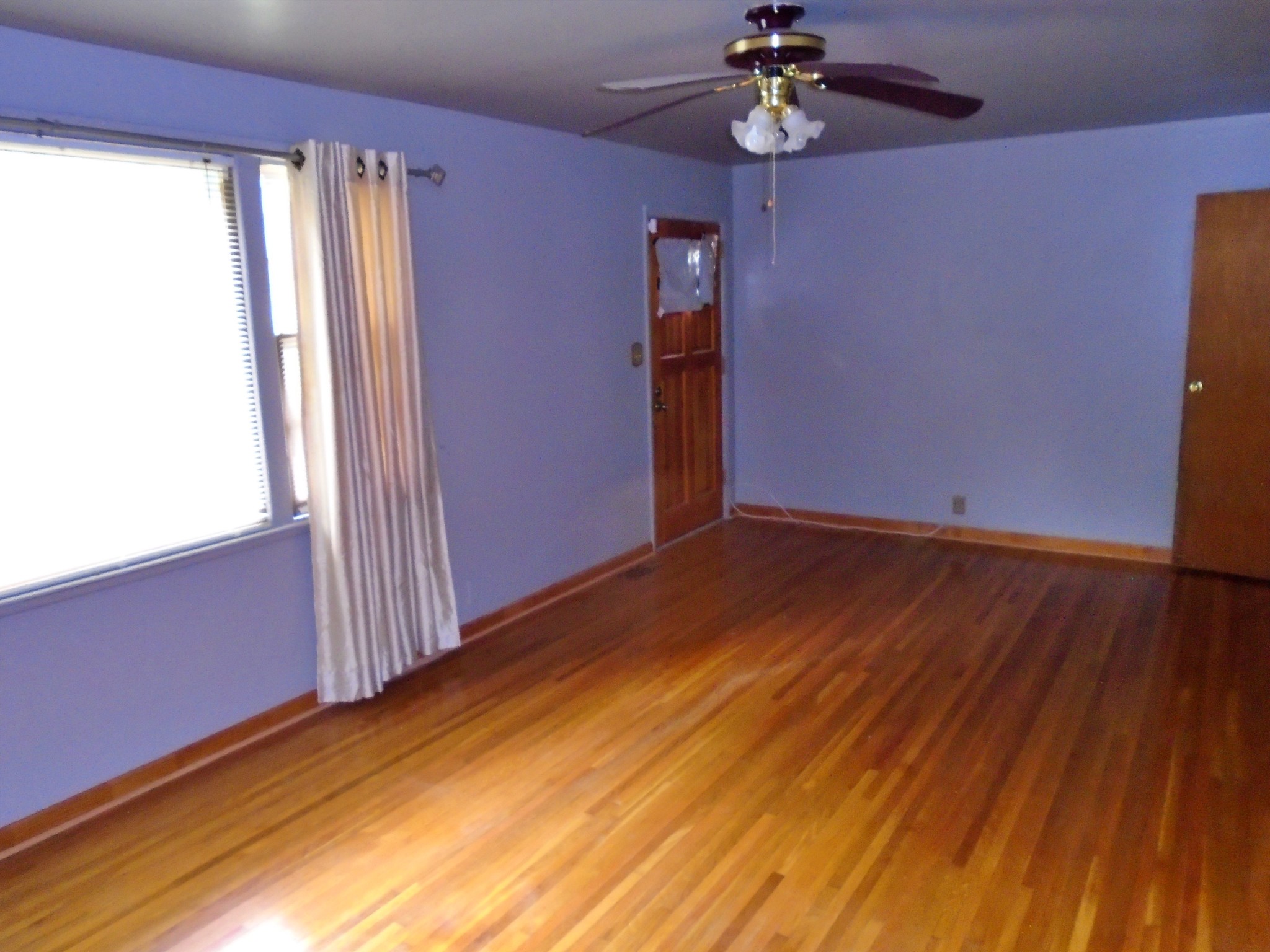 128 Kinneys School Road Springfield, TN 37172 - Photo 5 of 23 wooden floor in an empty room with a window