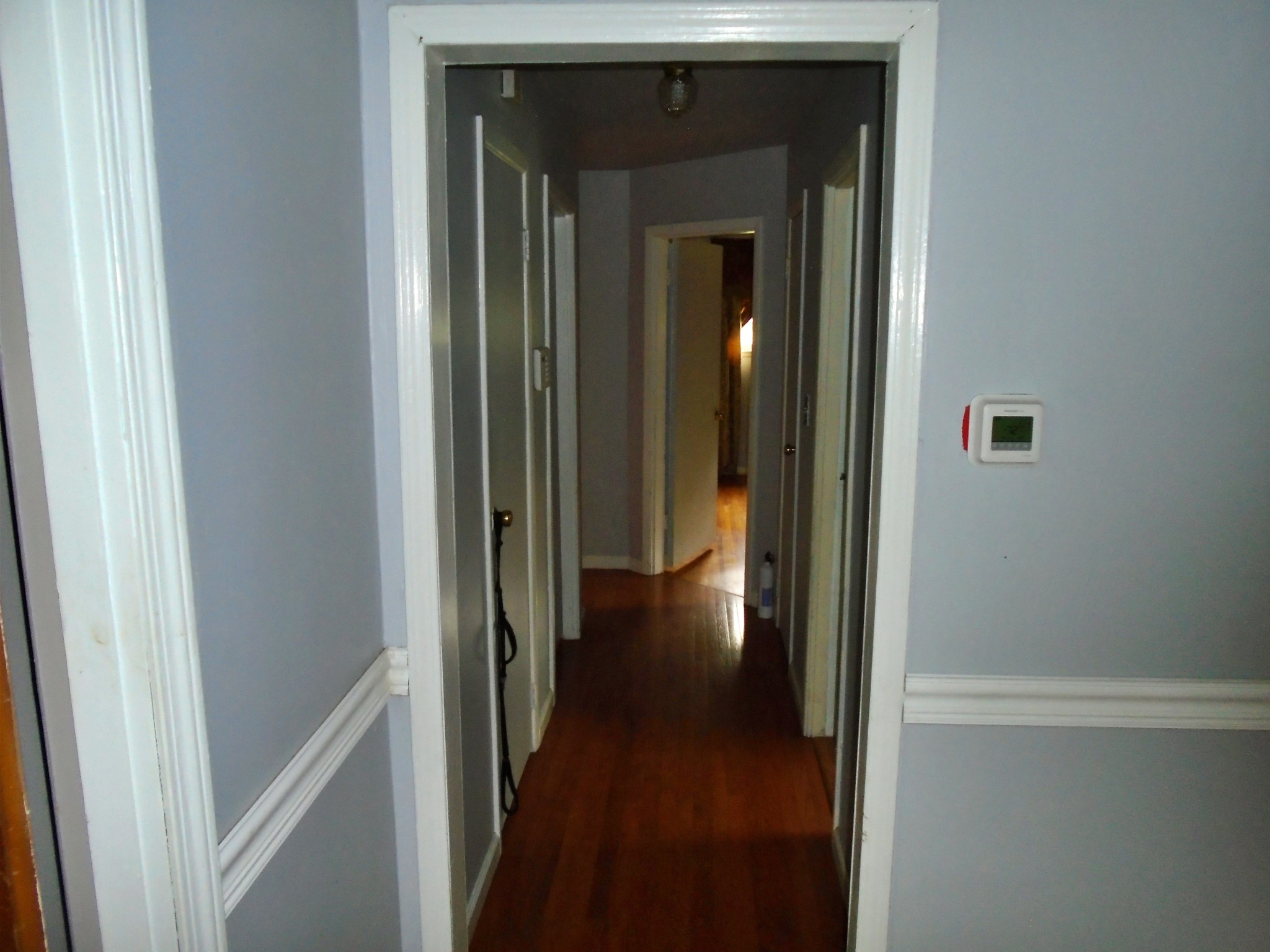 128 Kinneys School Road Springfield, TN 37172 - Photo 9 of 23 a view of a hallway with wooden floor