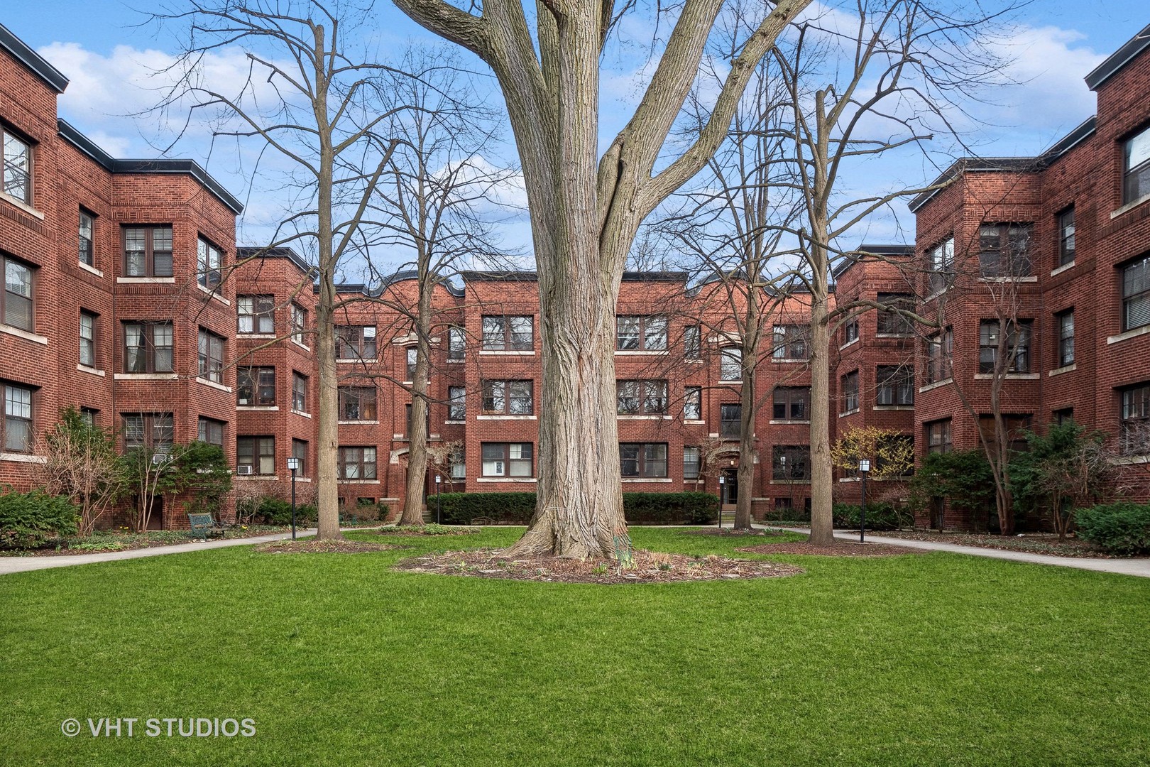 1119 Maple Avenue, Unit 2E Evanston, IL 60202 - Photo 1 of 12 a view of a building with a yard