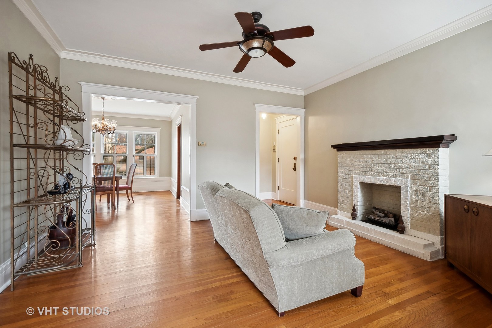 1119 Maple Avenue, Unit 2E Evanston, IL 60202 - Photo 4 of 12 a living room with furniture and a fireplace