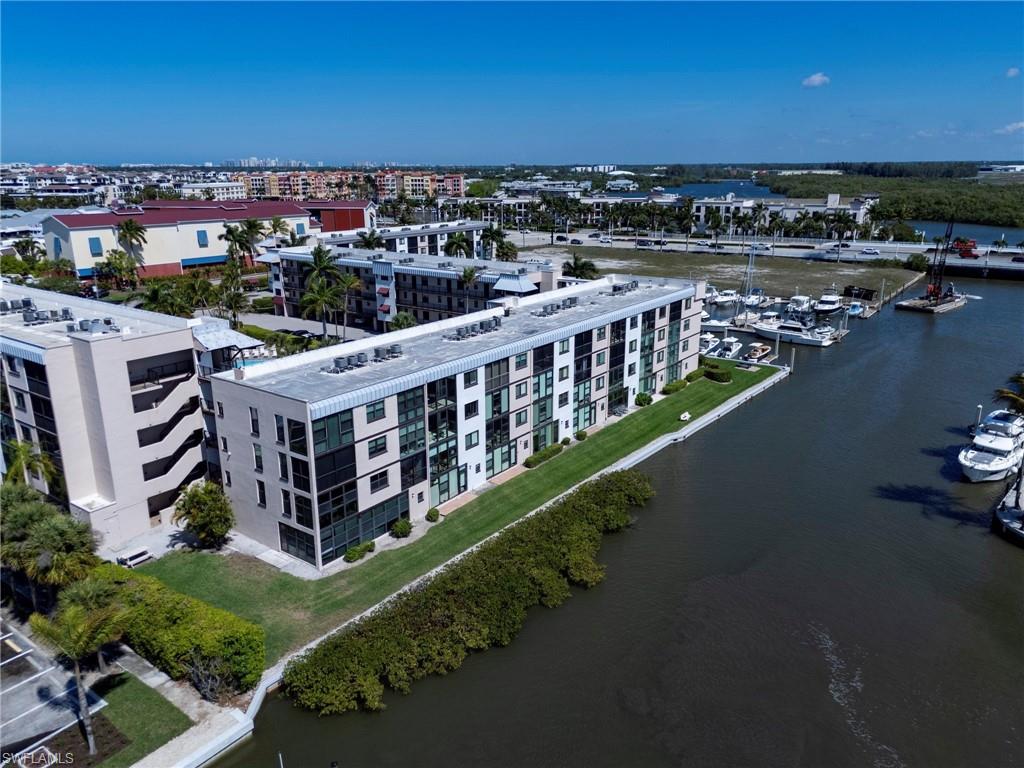 805 River Point Drive, Unit 103C Naples, FL 34102 - Photo 3 of 27 a view of a city from a balcony
